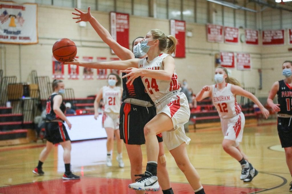 Hingham's leading scorer junior captain Pery Blasetti gets fouled on a lay-up. 