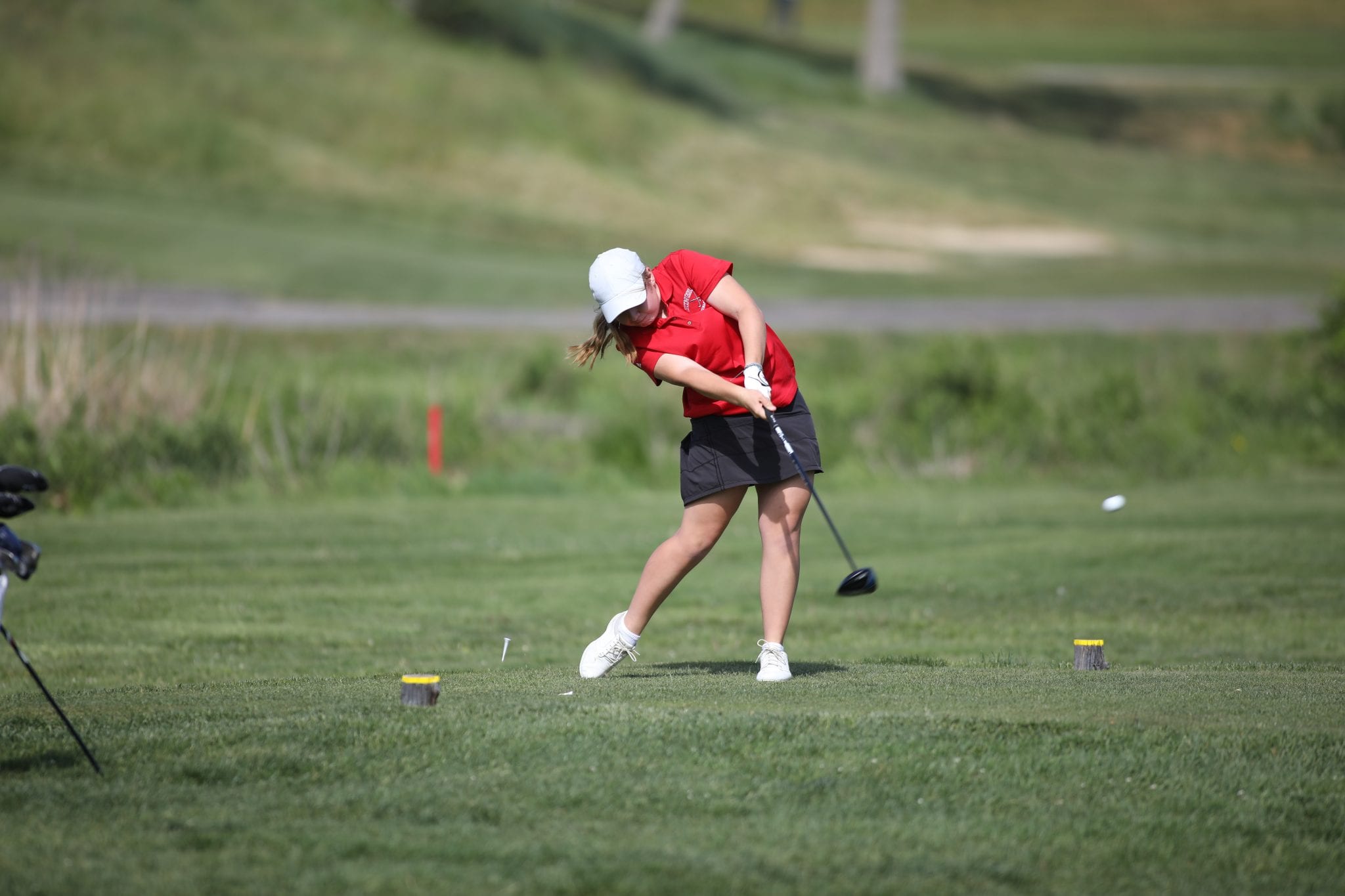 Sophomore Piper Jordan with a drive on the first hole.  
