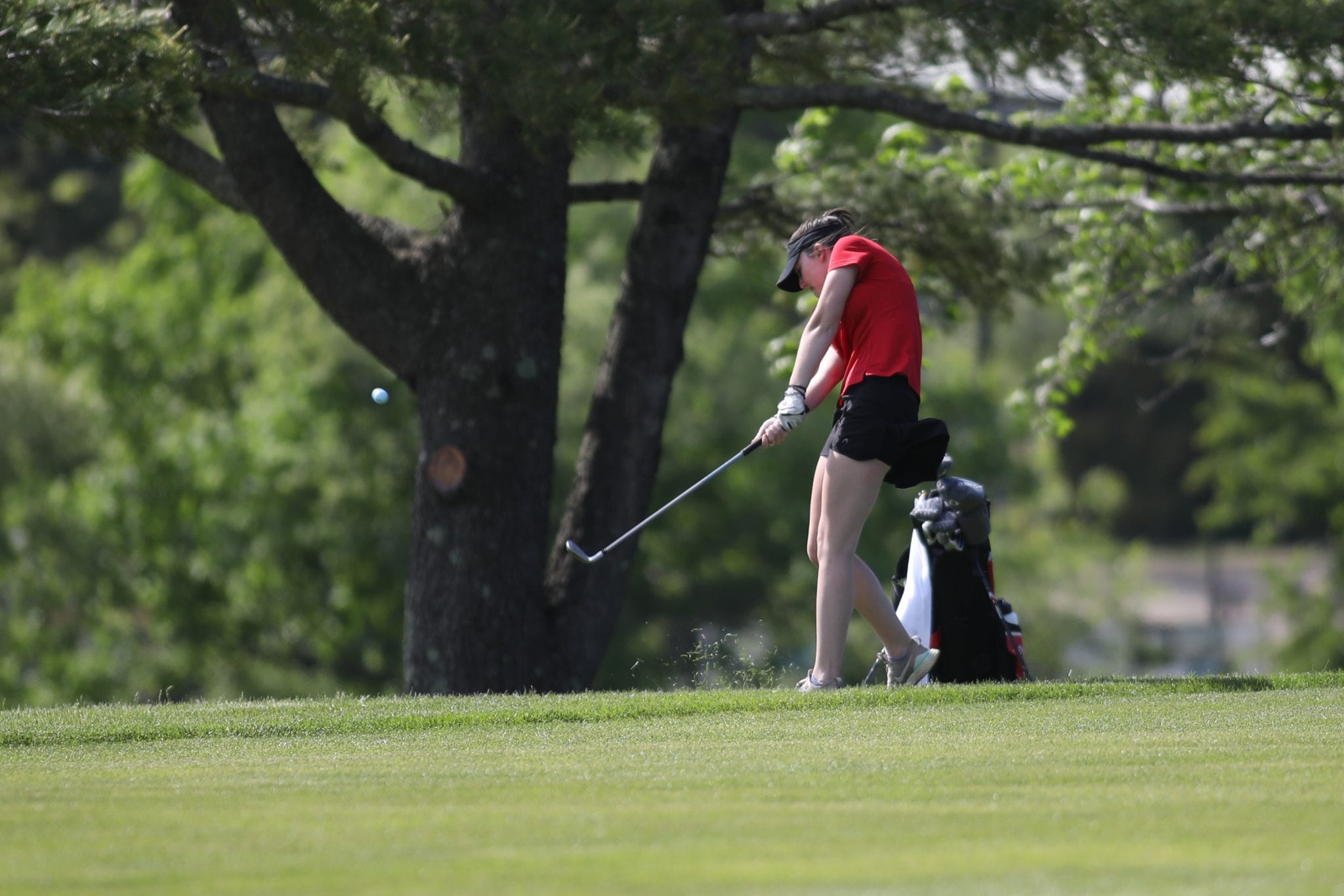 Senior captain Jaycee Waal with a wedge shot on the first hole.  