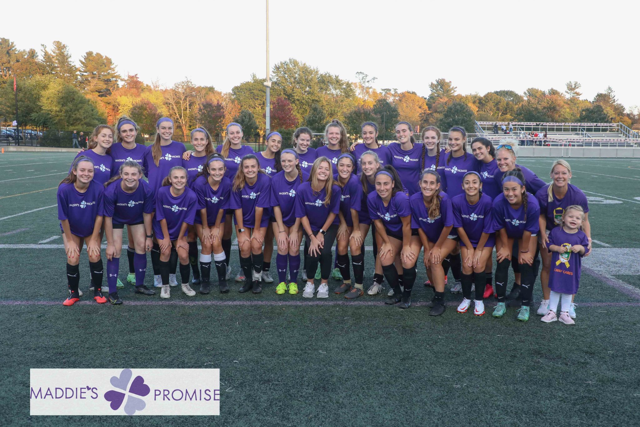 2021 Hingham High School Girls Soccer team poses for a photo with their Maddie's Promise T-shirts.