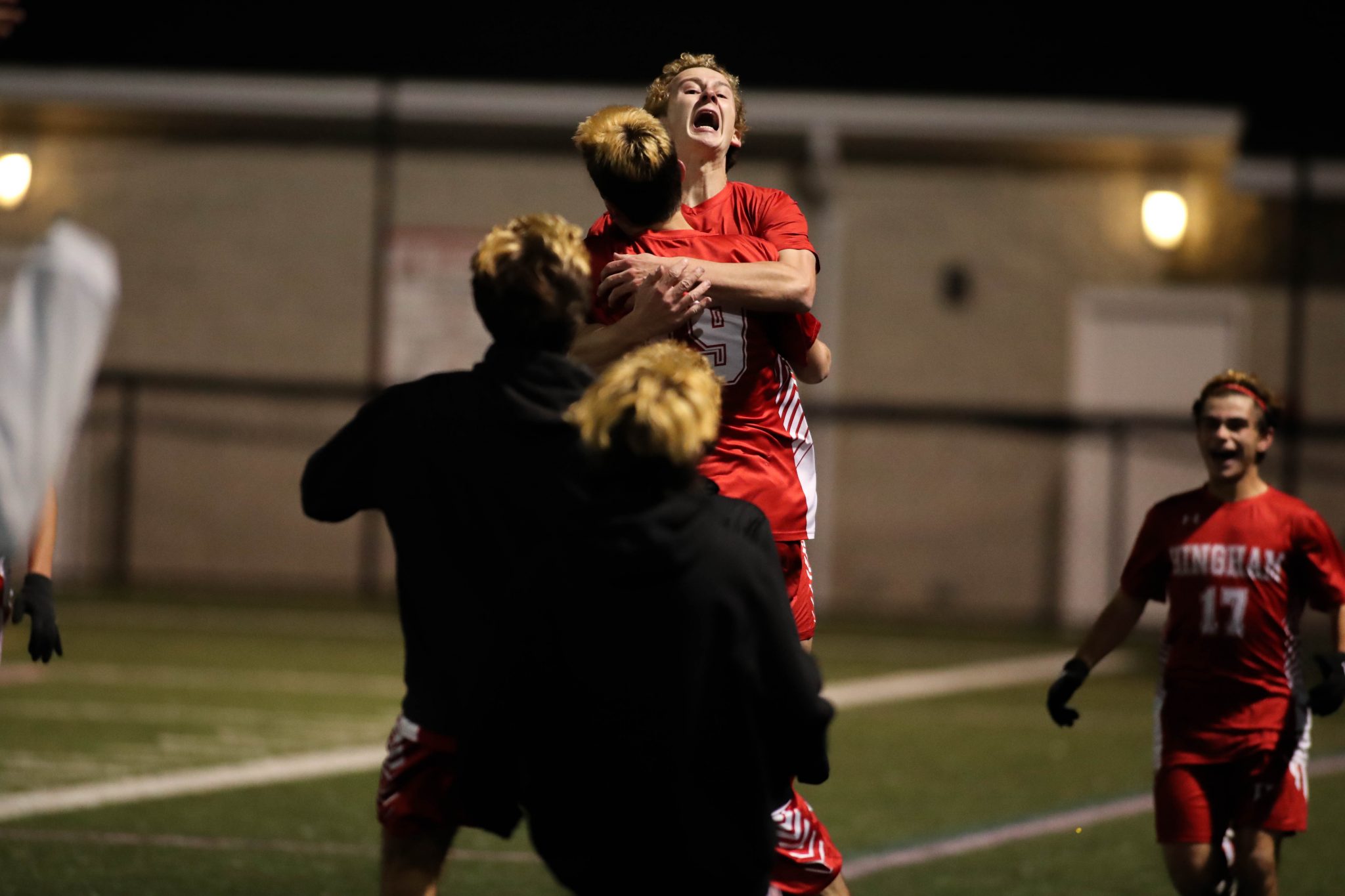Junior Aidan Brazel jumps into his teammates arms after scoring the winning goal in OT.