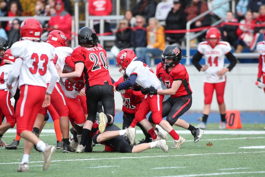 Liam Rodgers with the tackle behind the line of scrimmage.