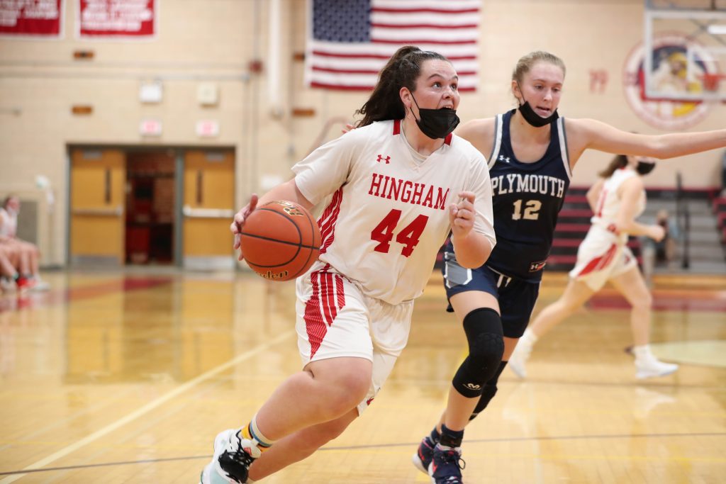 Junior Sarah Holler drives to the basket early in the game against Plymouth North