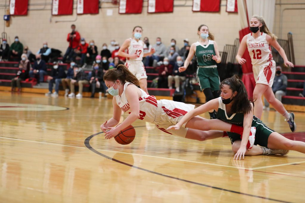 Senior Madison Aylward jumps on a loose ball. 