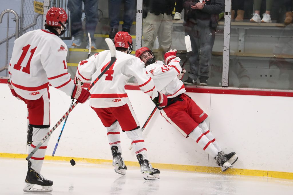 Junior Ace Concannon celebrates a bit too much after his goal putting the Harbormen ahead for good. 