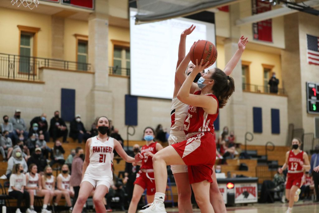 Junior captain Colette Hanney looks to add to Hingham's first half lead. 