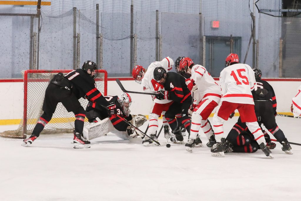 Hingham looking to add more with lots of traffic in front of the Cardinal's net. 