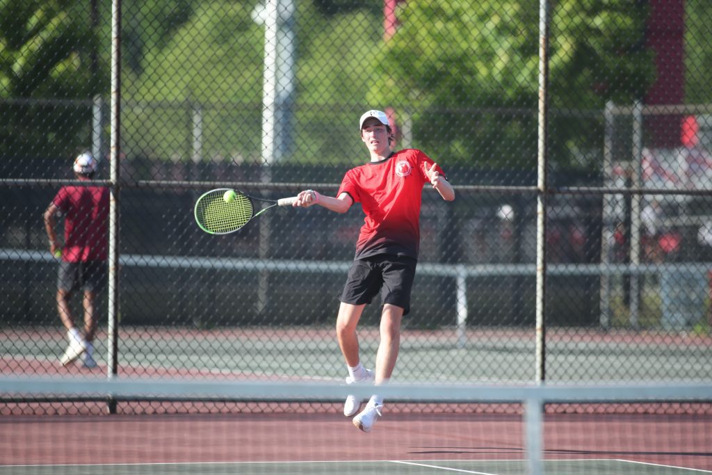 Sophomore Travis Rugg during his epic 2.5 hour match, which he eventually won in 3 sets.