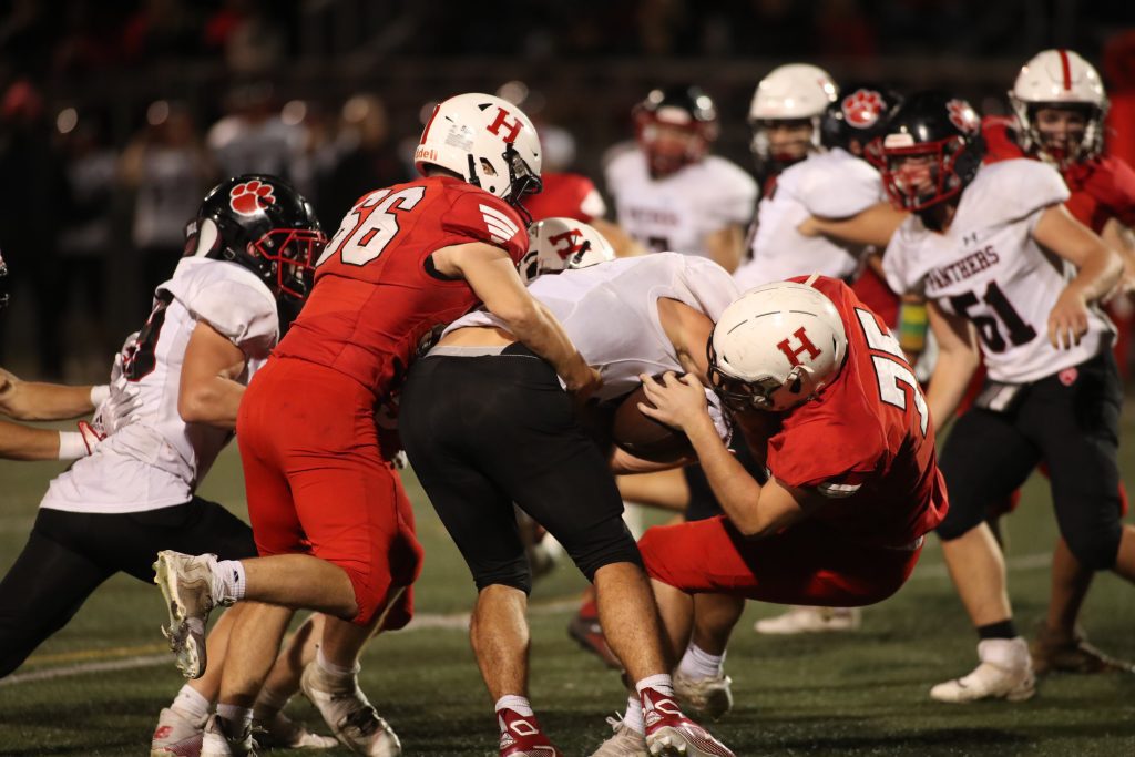 Hingham's defensive line smothered the Panther's running game. 