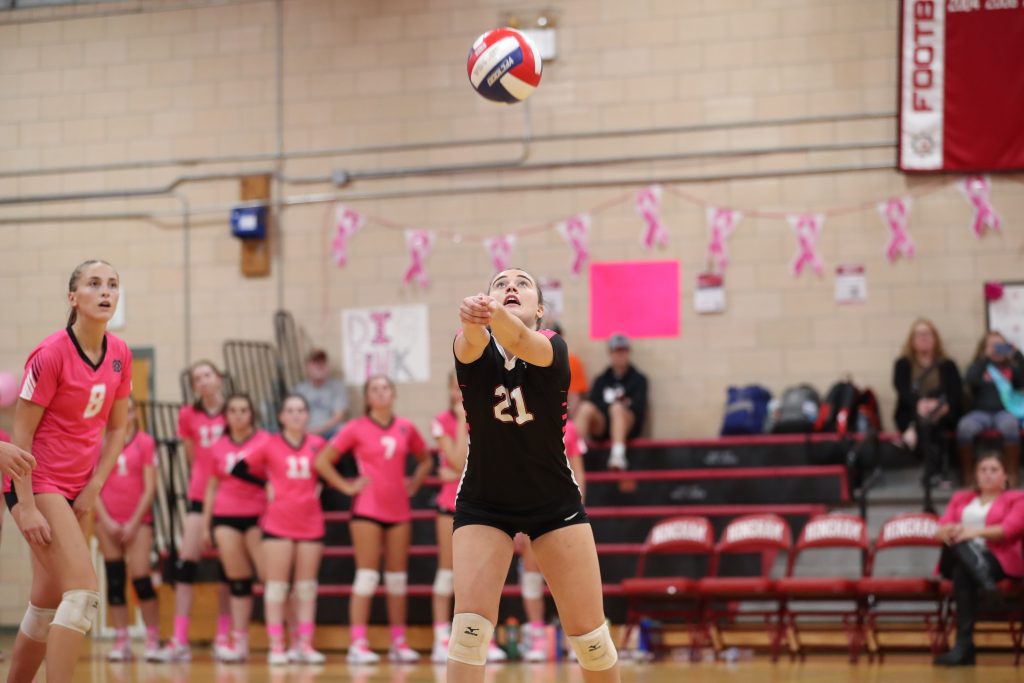 Senior captain Colette Hanney sets the ball early in the first game. 