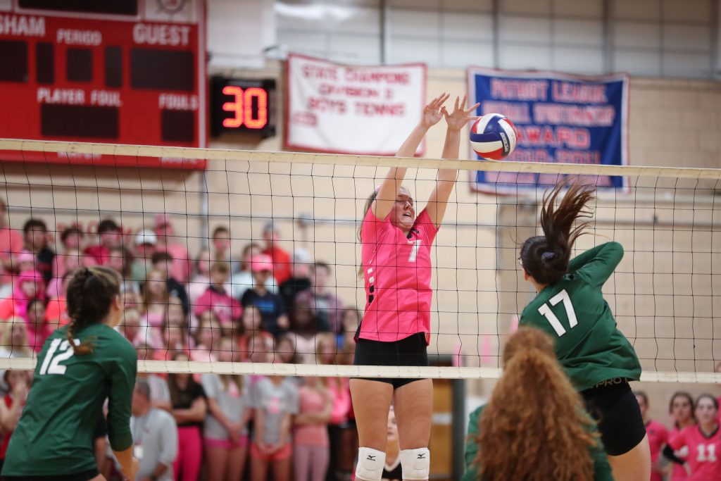 Senior Lizzie Beyer with one of her many blocks throughout the match.