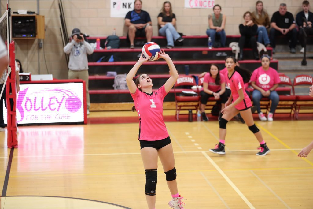 Sophomore Olivia Tamburro sets up her teammates in the second game. 