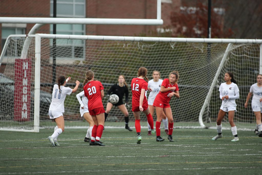 Junior Claire Murray puts the game away in the second half with Hingham's 3rd goal. 