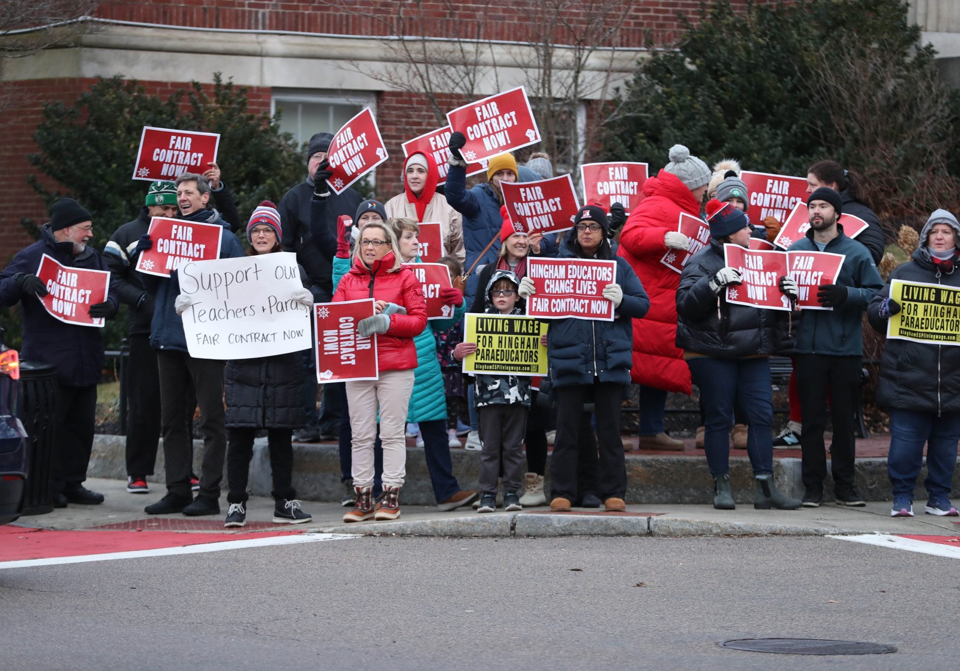 Supporters of Hingham Teachers and Paraeducators gather at a rally in Downtown Hingham as they negotiate a new contract.  Photo by Josh Ross. 