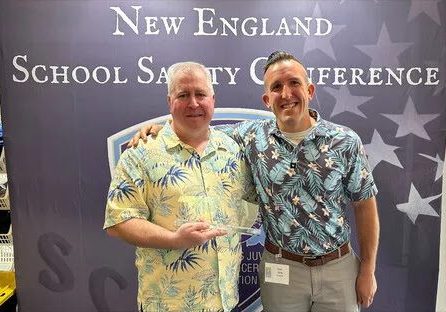 Officer Robert Ramsey and Officer Tom Ford pose together at the New England School Safety Conference where Ramsey was named School Resource Officer of the Year. (Photo Courtesy Hingham Police Department)